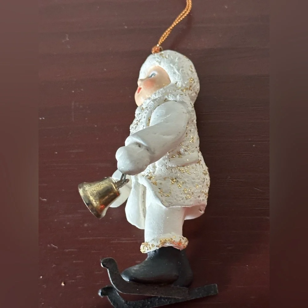 Vintage Department 56 White and Black “Belsnickle” ornament with ringing bell.